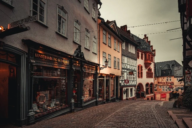 Photo of storefronts on a small german street